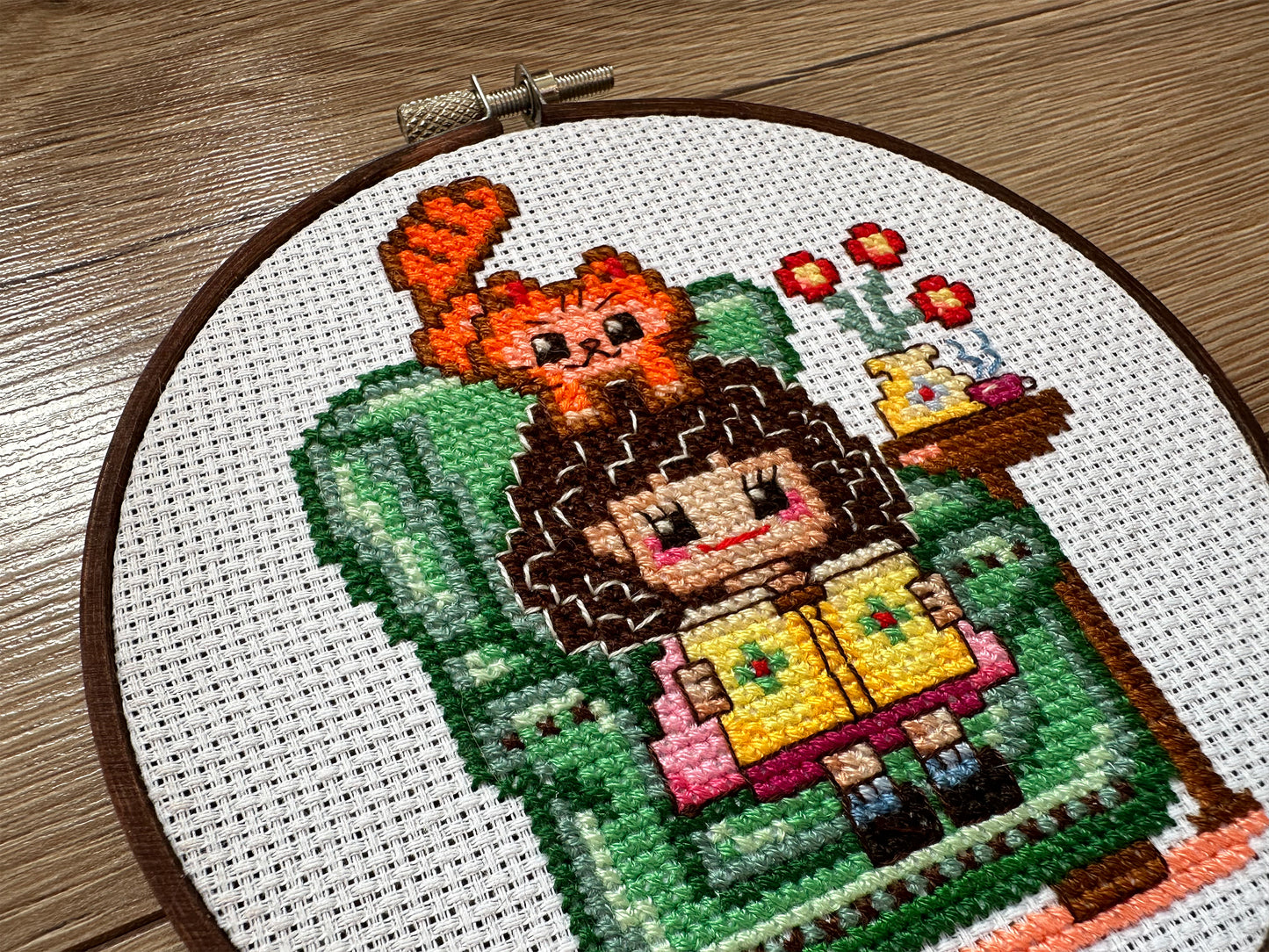 Cute girl in chair with book PDF cross stitch pattern