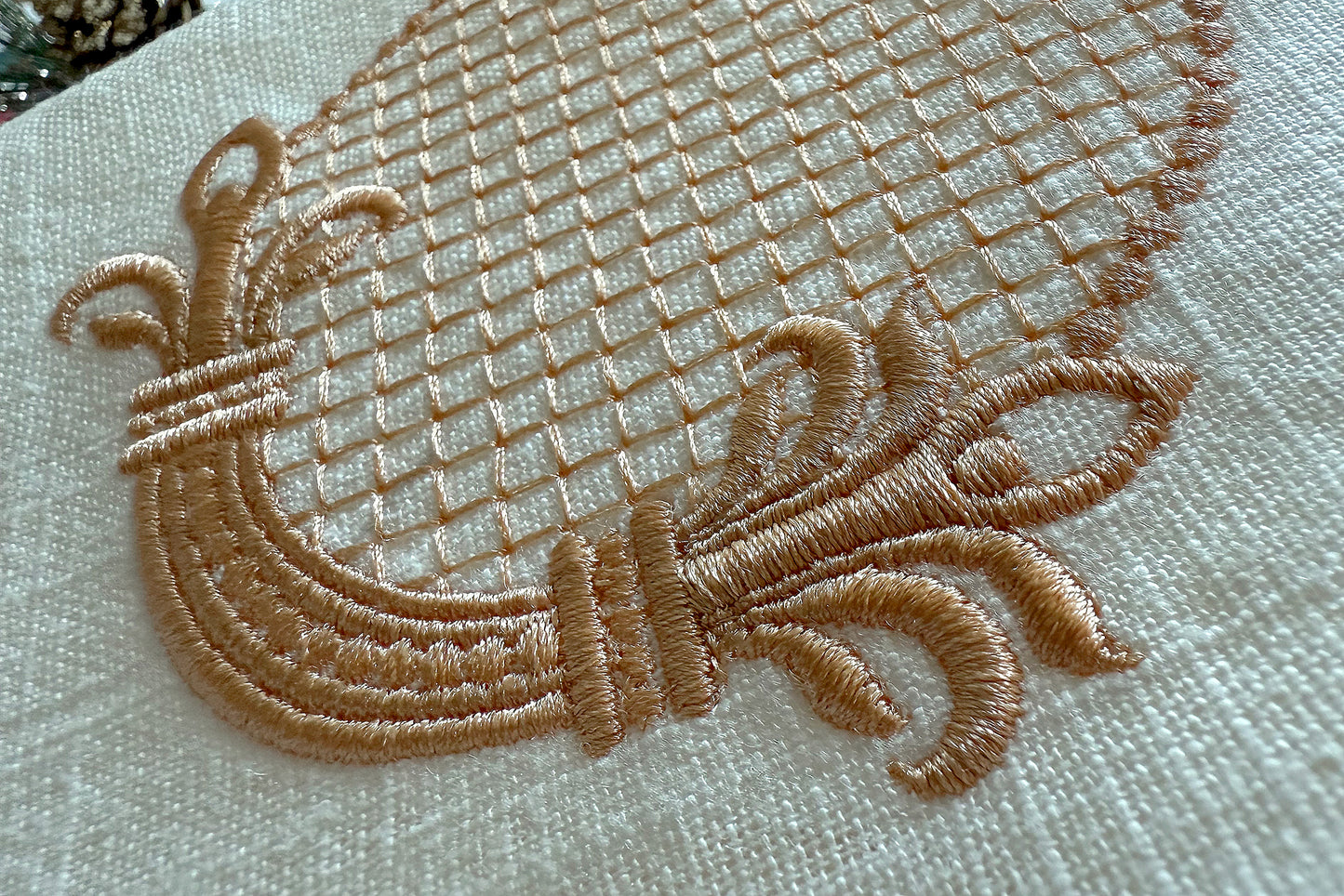 Close-up of retro frame embroidery for napkin decoration in one thread color