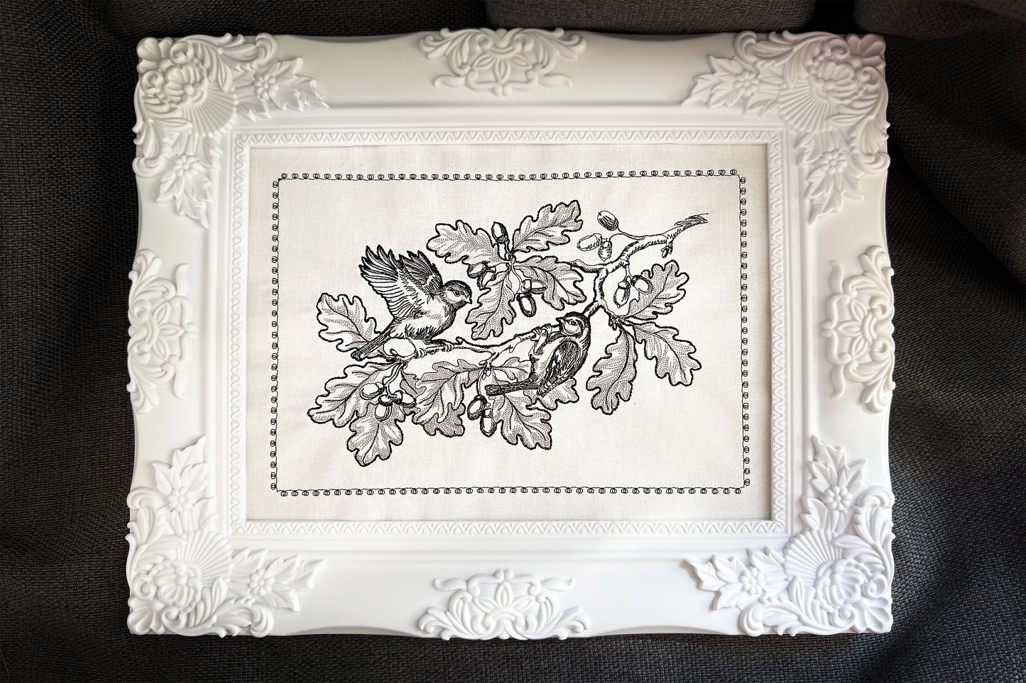 Thanksgiving embroidery design with birds resting on oak branches