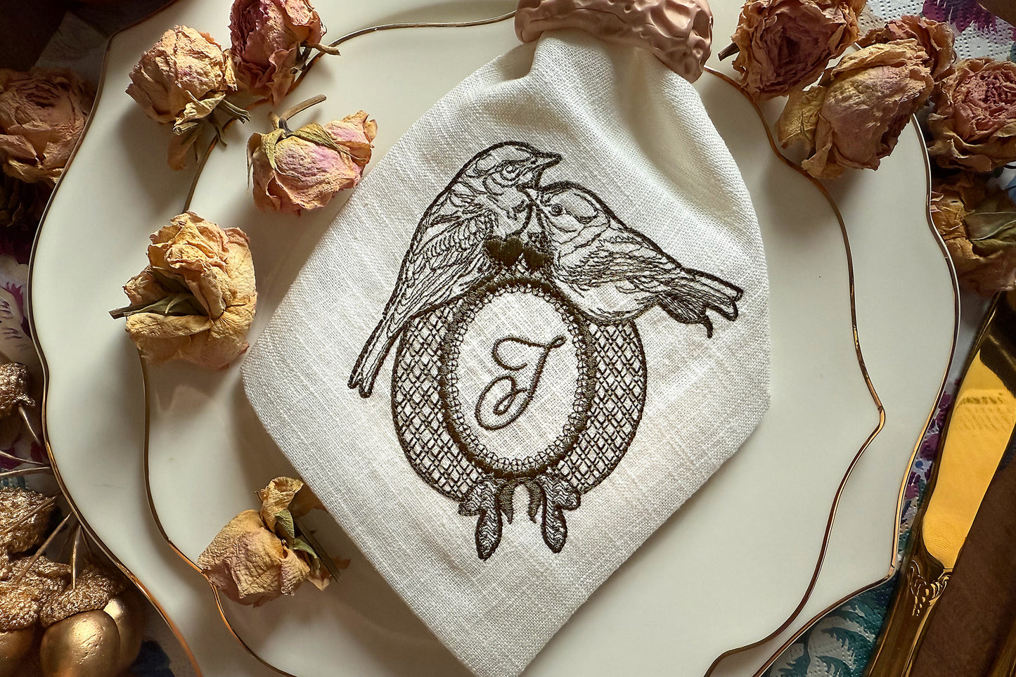 Machine embroidery pattern with birds and hearts