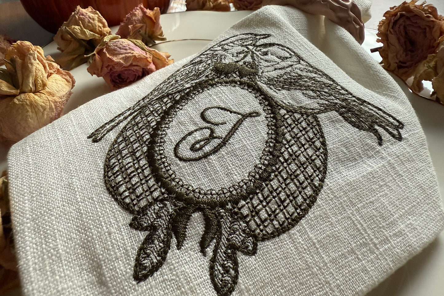 Embroidery motif with birds and hearts in classic style