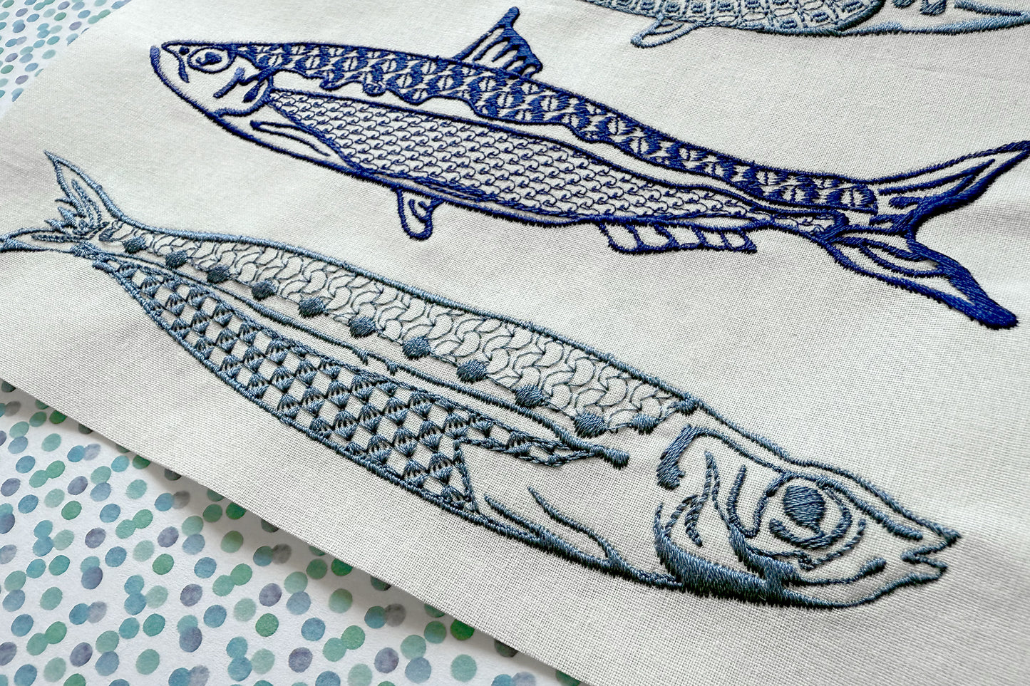 Close-up of stylish sardine embroidery pattern for kitchen décor