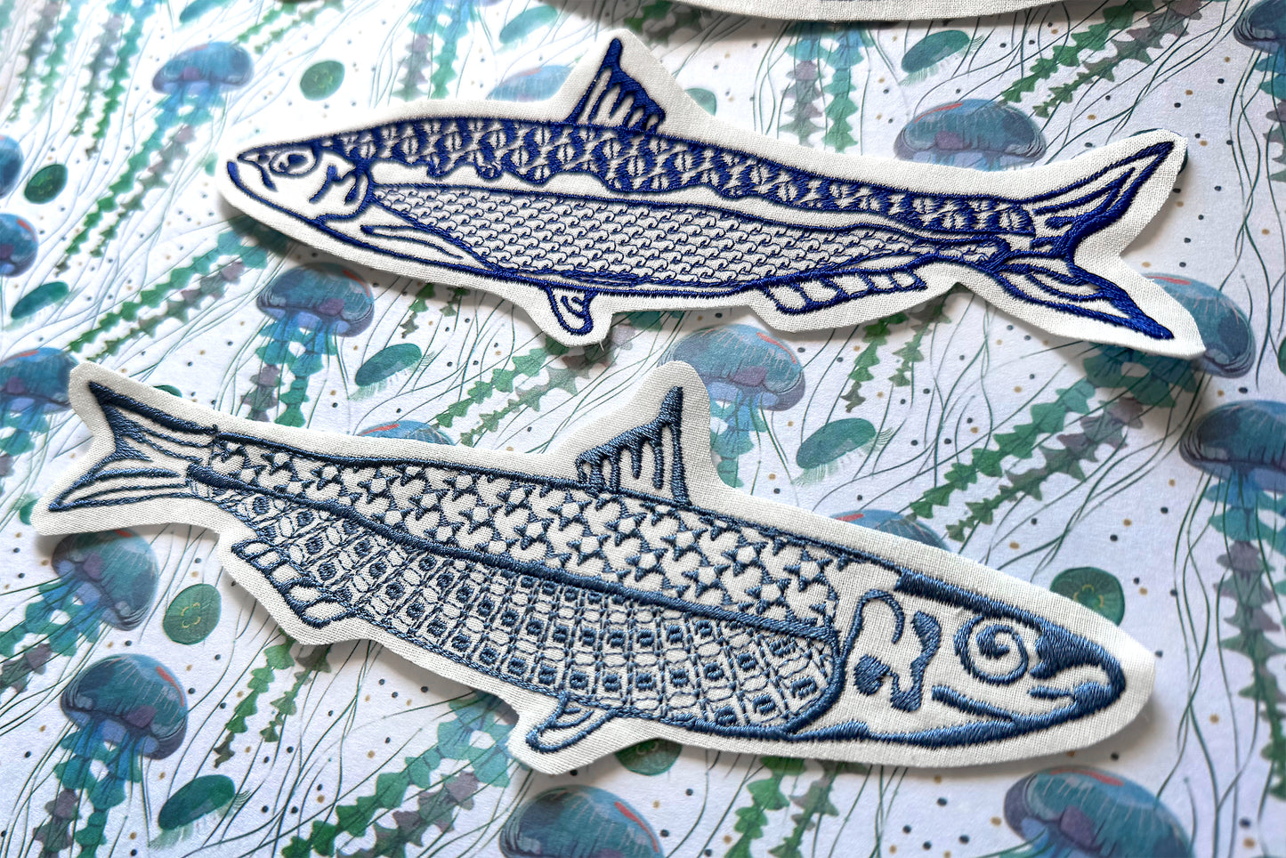 Minimal one-color sardine embroidery patterns