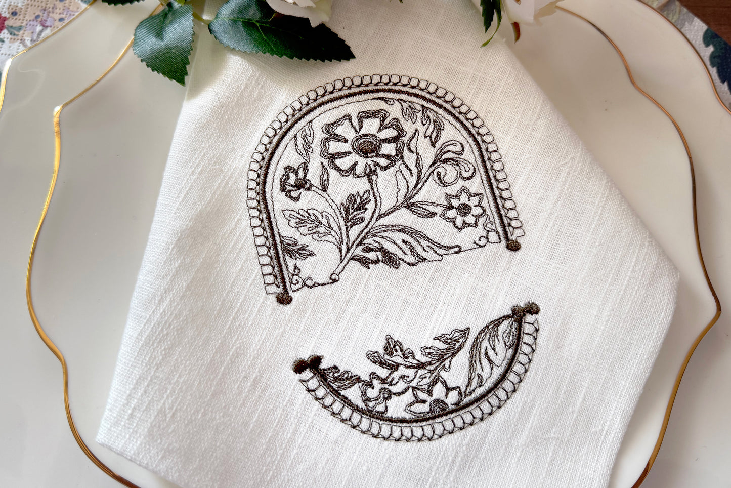 Elegant floral embroidery frame with space for initials