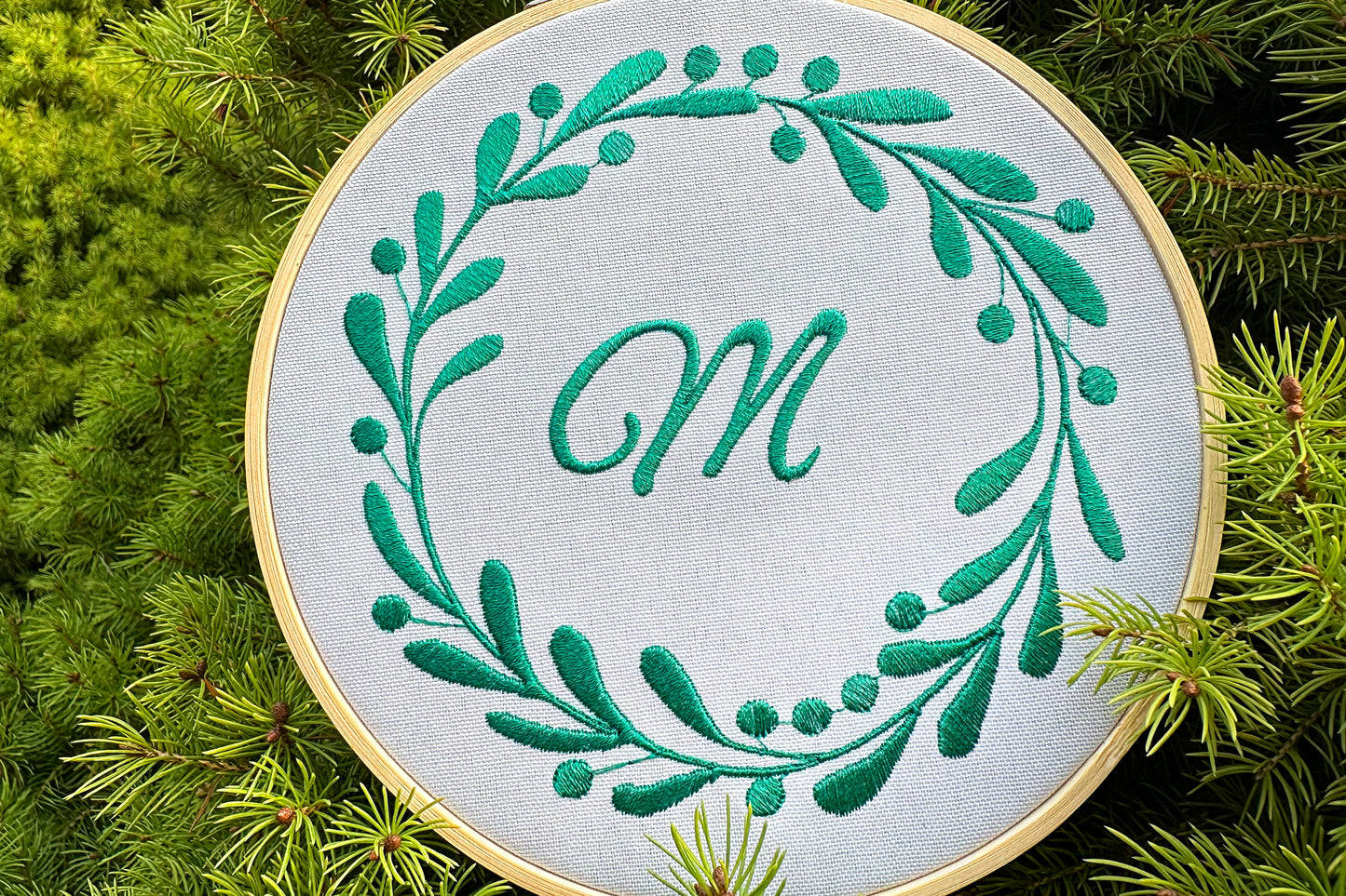 Round floral monogram machine embroidery design
