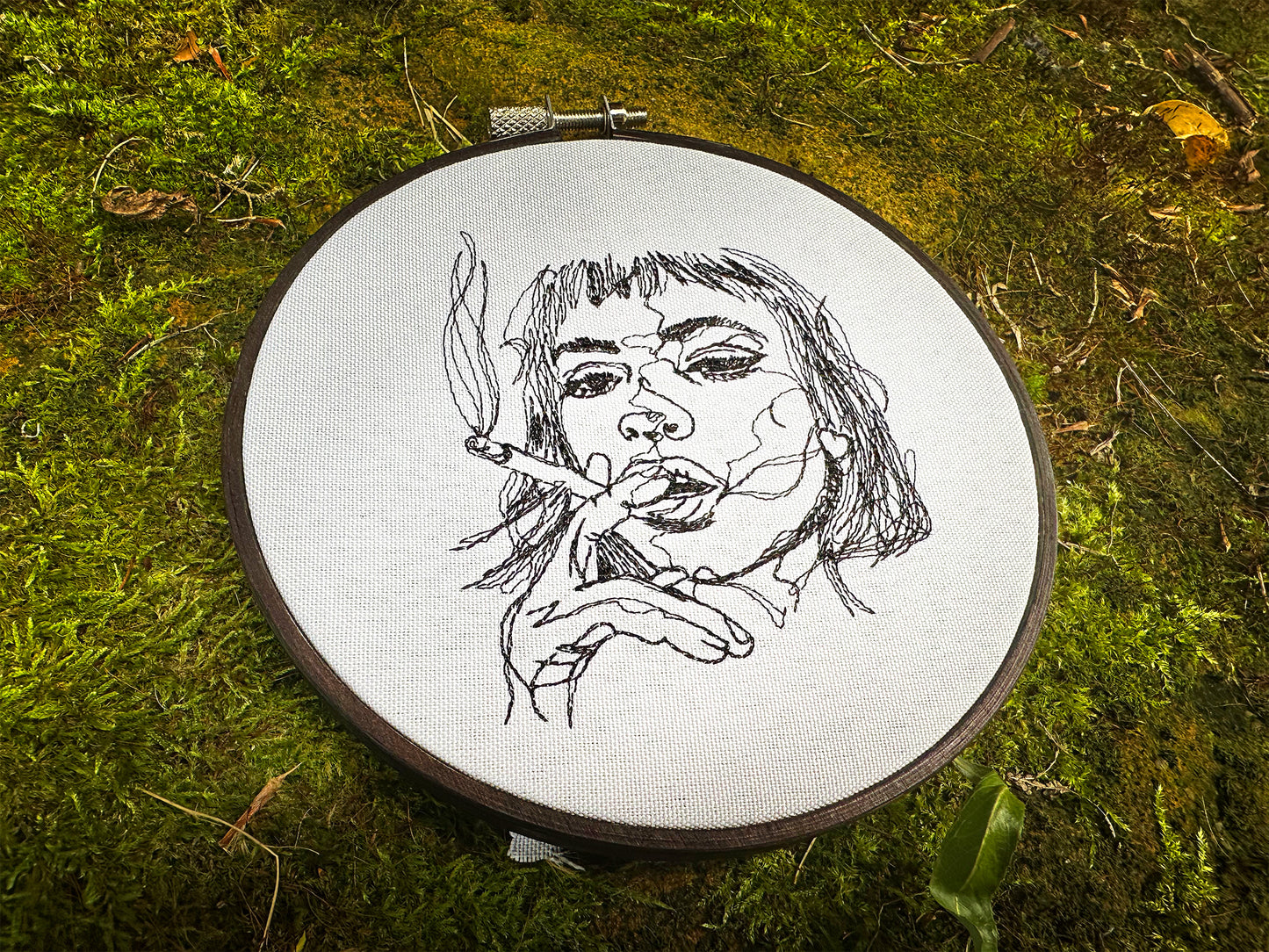 Girl with a cigarette machine embroidery design