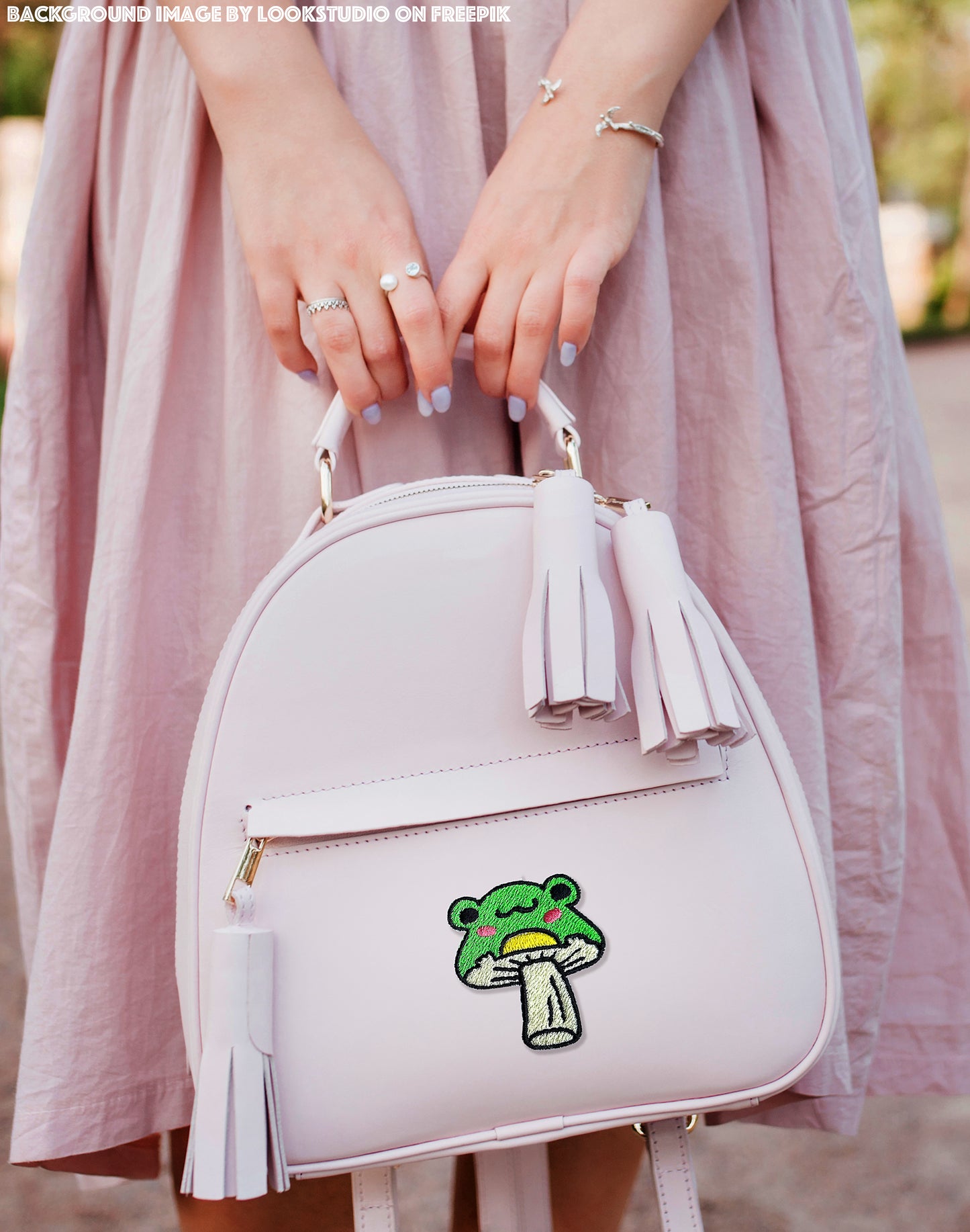 Funny mushroom frog design stitched in vibrant colors on woman bag