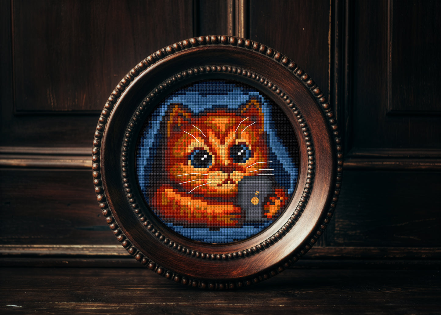 Funny modern cross stitch of cat scrolling on smartphone
