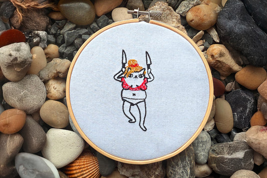 Funny cat embroidery inspired by Britney Spears in red outfit with knives