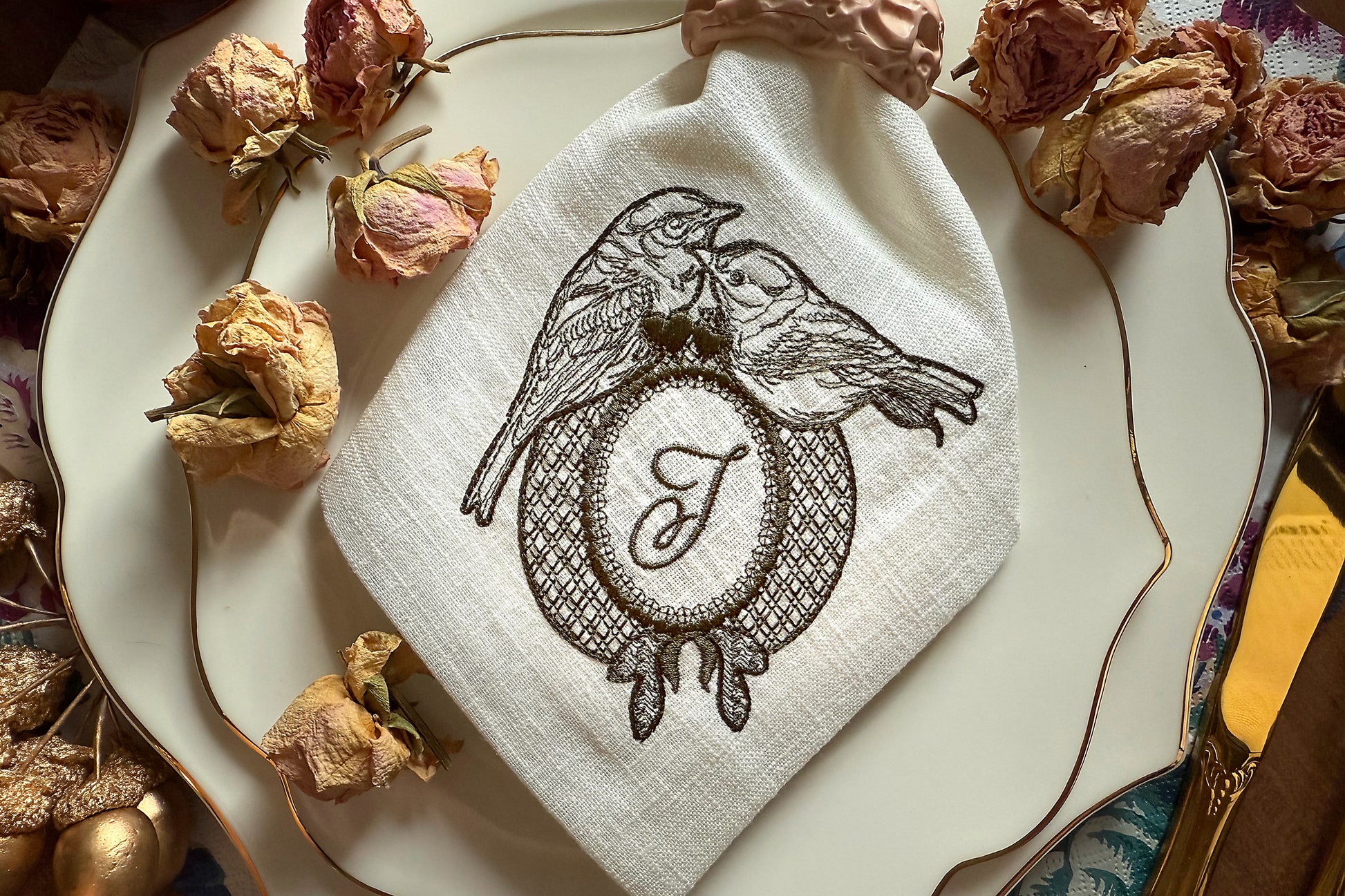 Machine embroidery pattern with birds and hearts