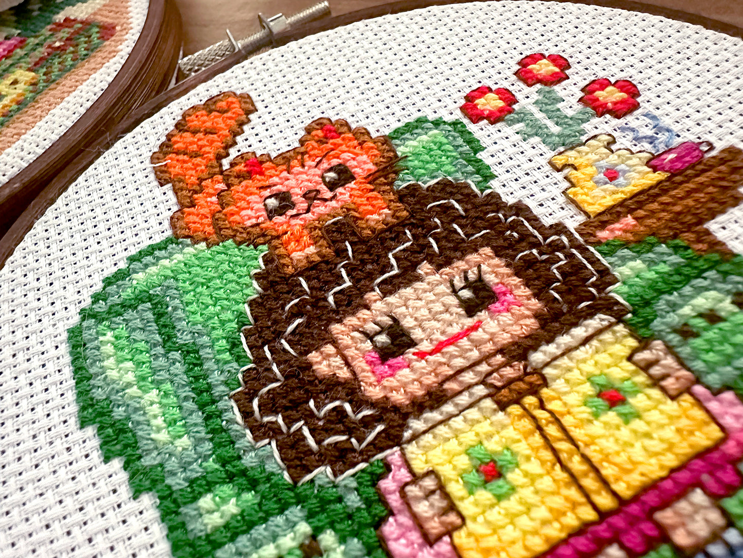 Cute girl in chair with book PDF cross stitch pattern