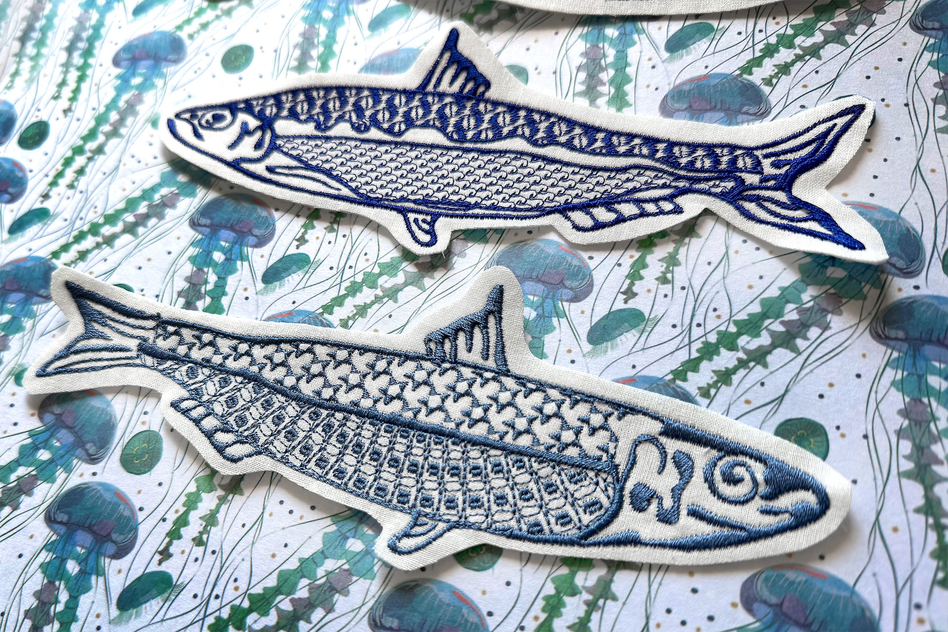 Minimal one-color sardine embroidery patterns