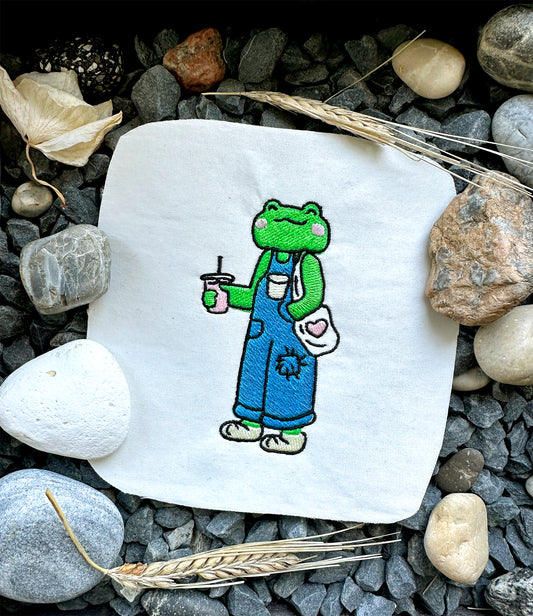 Funny frog with shopper machine embroidery design