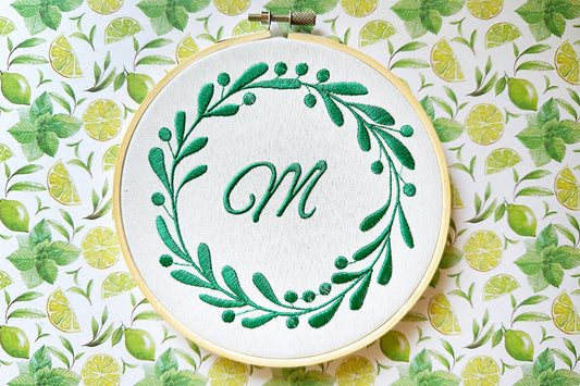 Round floral monogram machine embroidery design