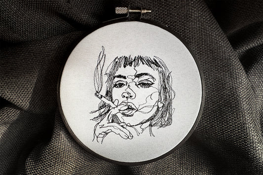 Girl with a cigarette machine embroidery design