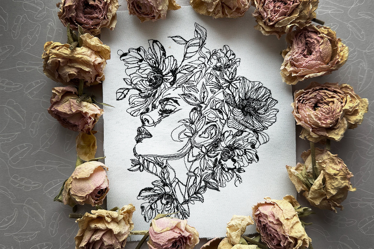 One line lady face machine embroidery