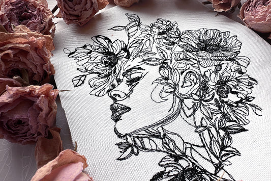 One line lady face machine embroidery