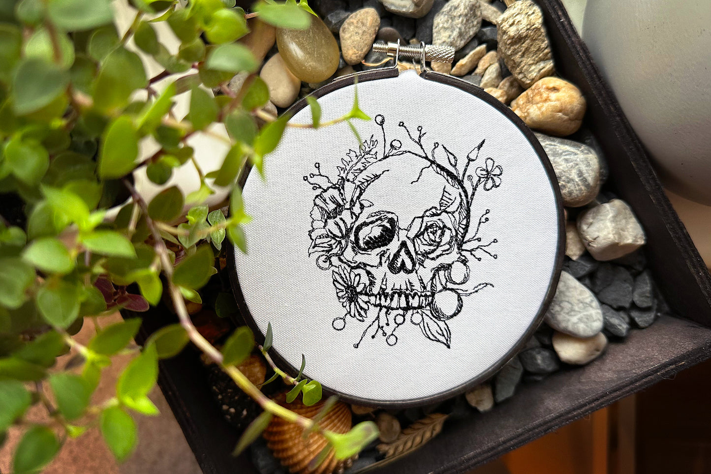 Scull in flowers machine embroidery
