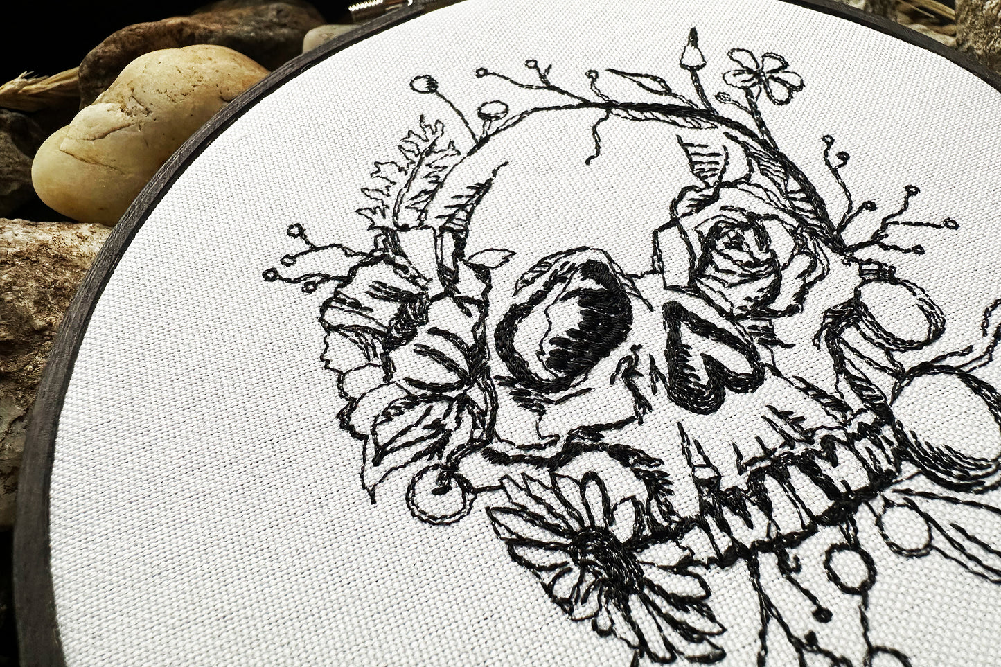 Scull in flowers machine embroidery