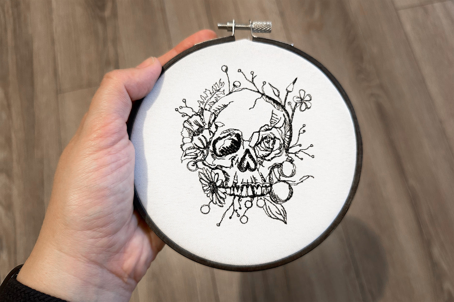 Scull in flowers machine embroidery