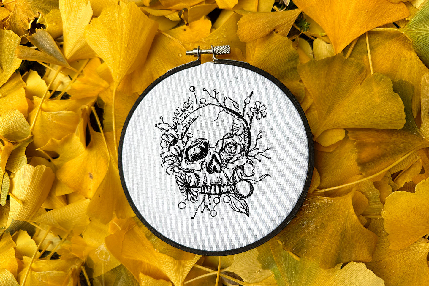 Scull in flowers machine embroidery