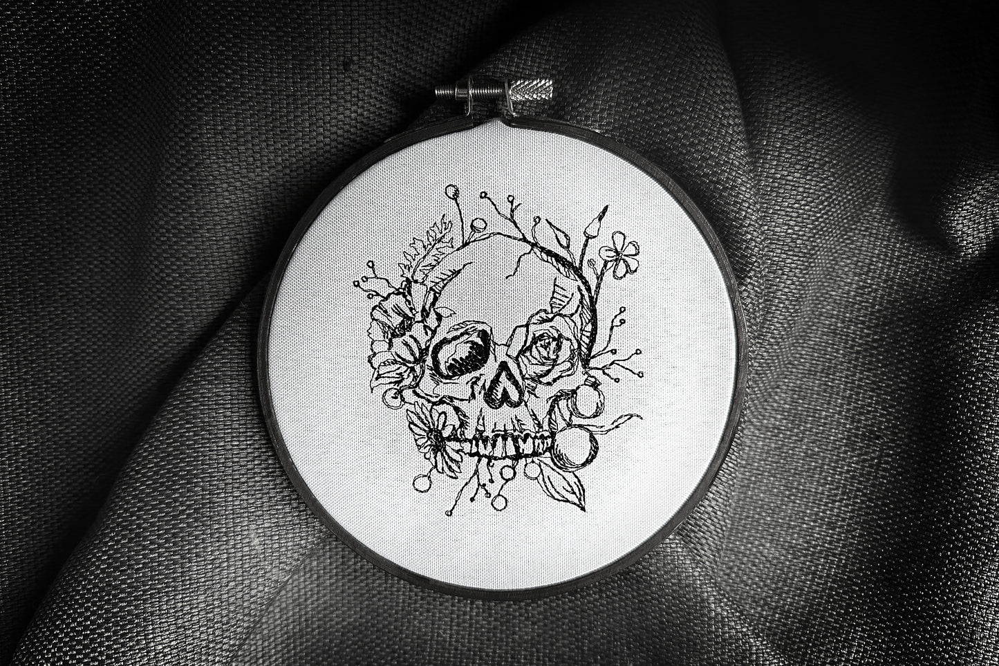 Scull in flowers machine embroidery