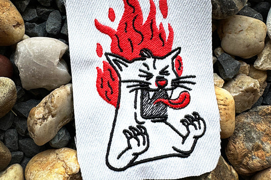 Screaming cat machine embroidery design, cat on fire