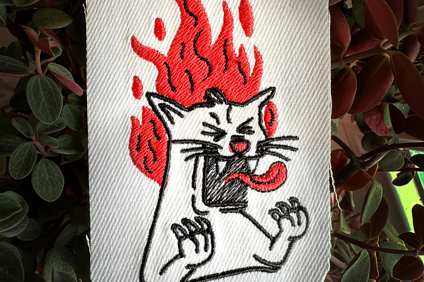 Screaming cat machine embroidery design, cat on fire