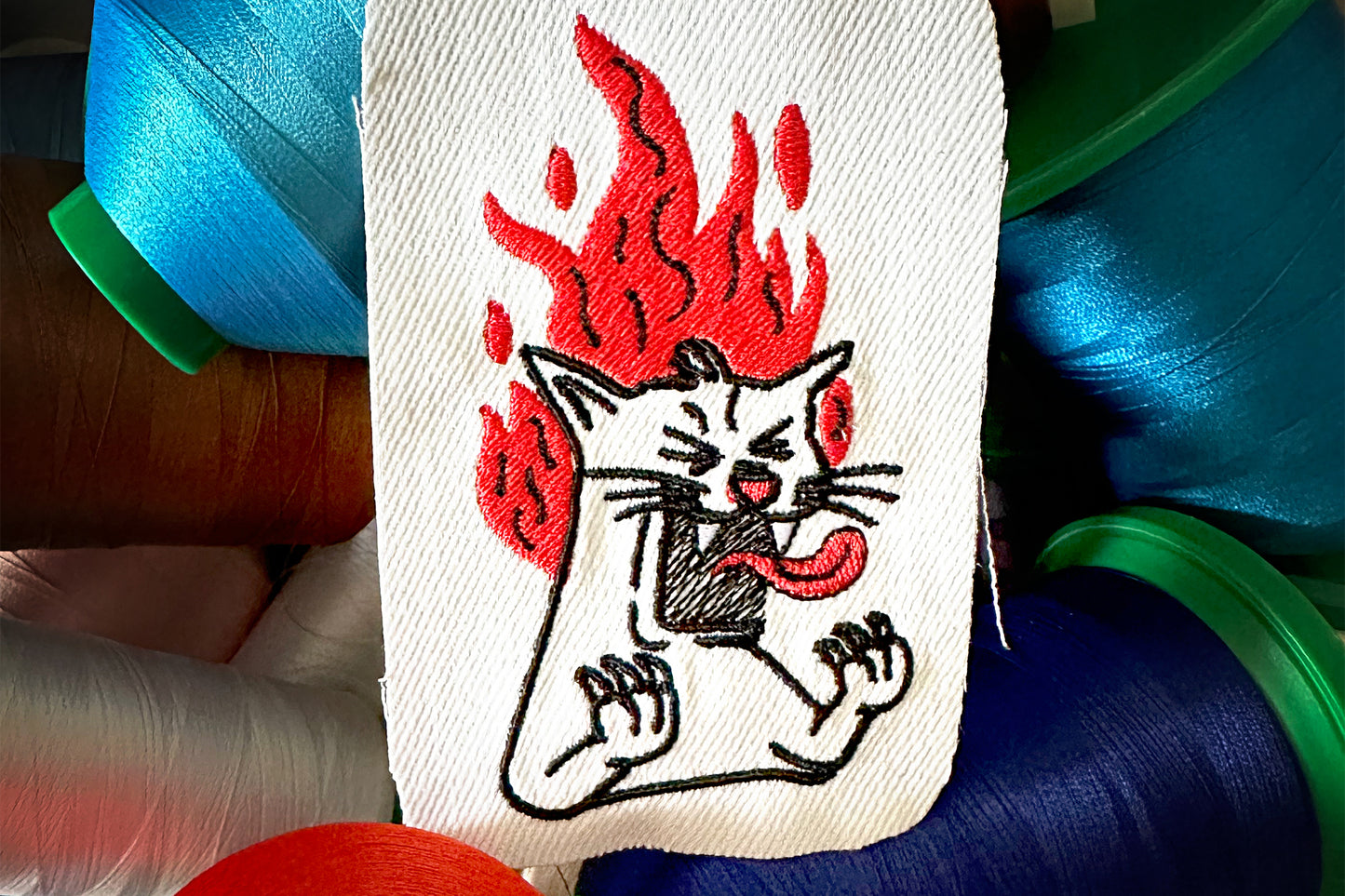 Screaming cat machine embroidery design, cat on fire