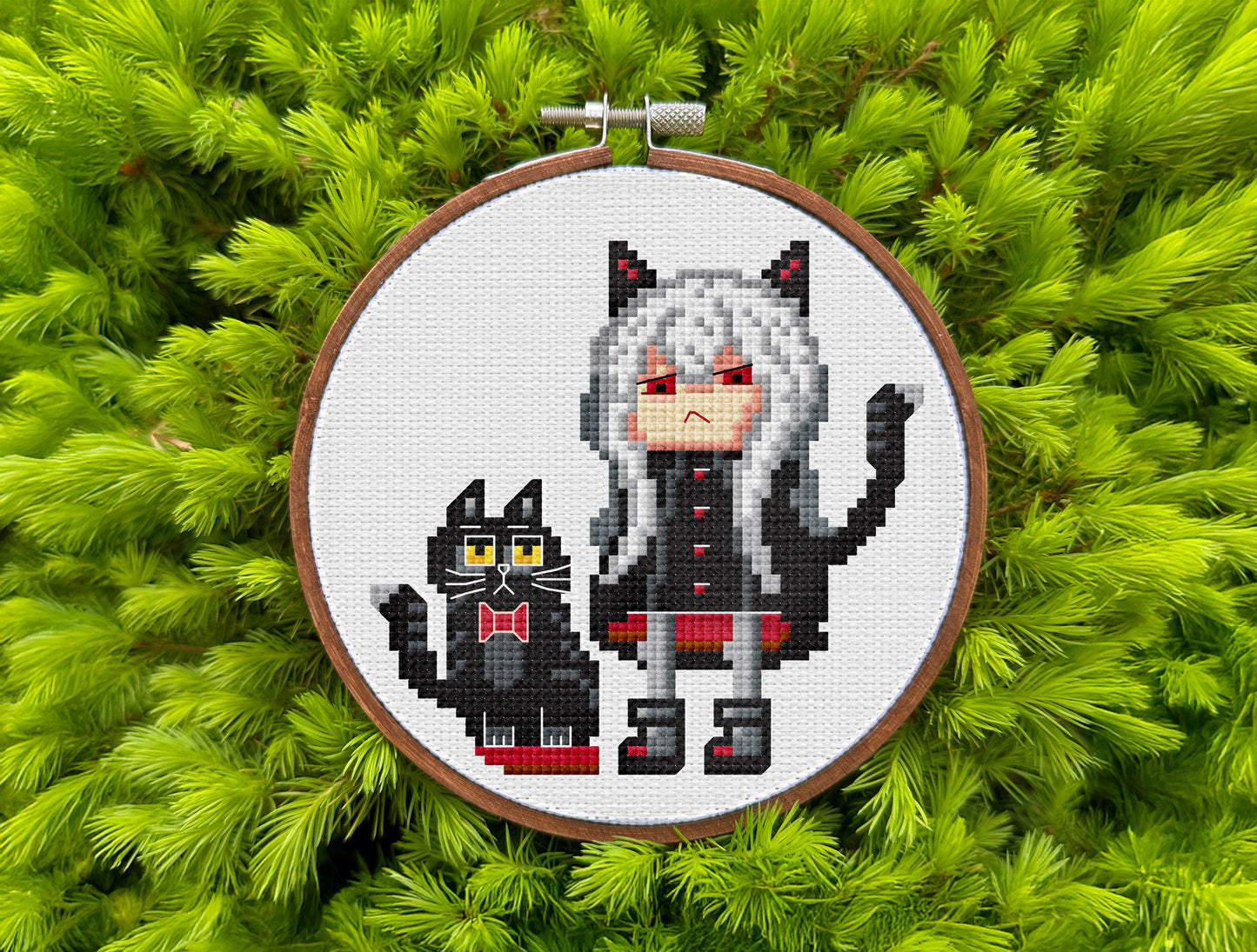 Modern embroidery design featuring silver-haired girl and dark cat