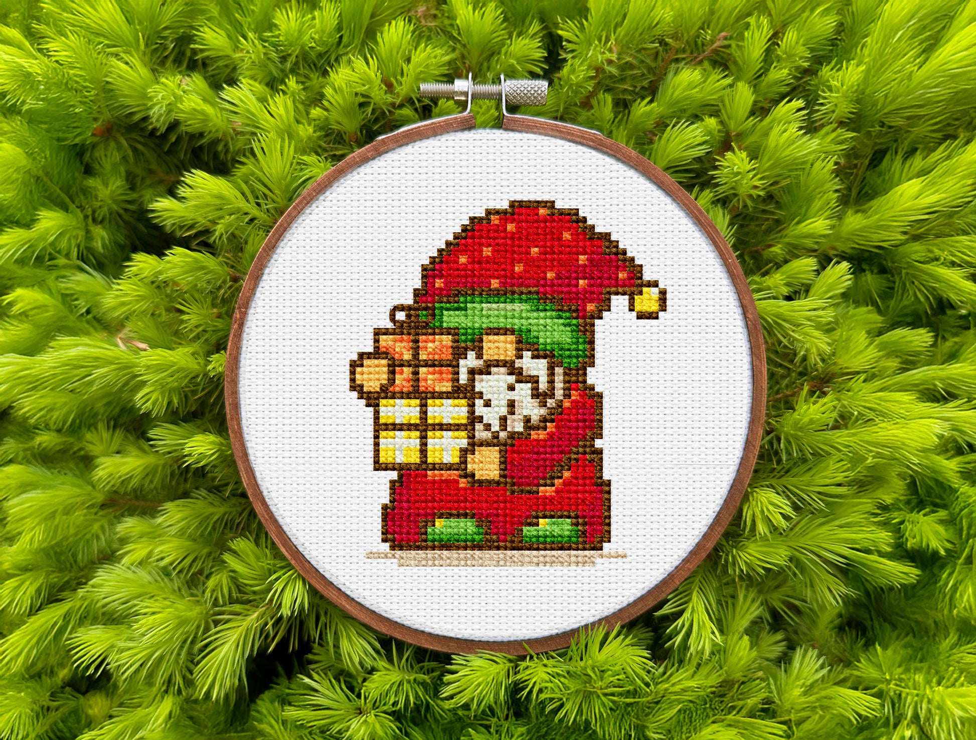 Holiday gnome embroidery pattern in pixel-art style