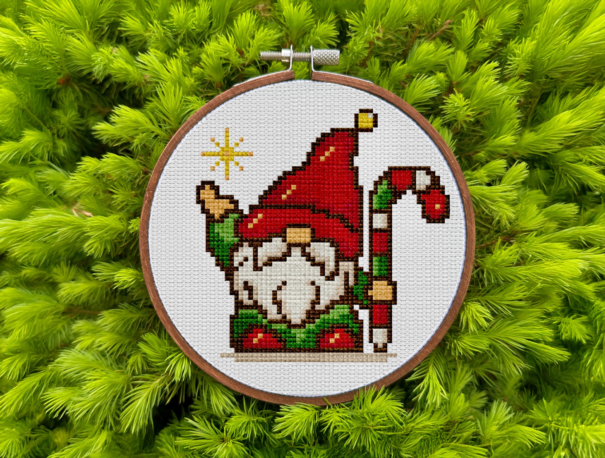 Festive embroidery design with holiday gnome and star