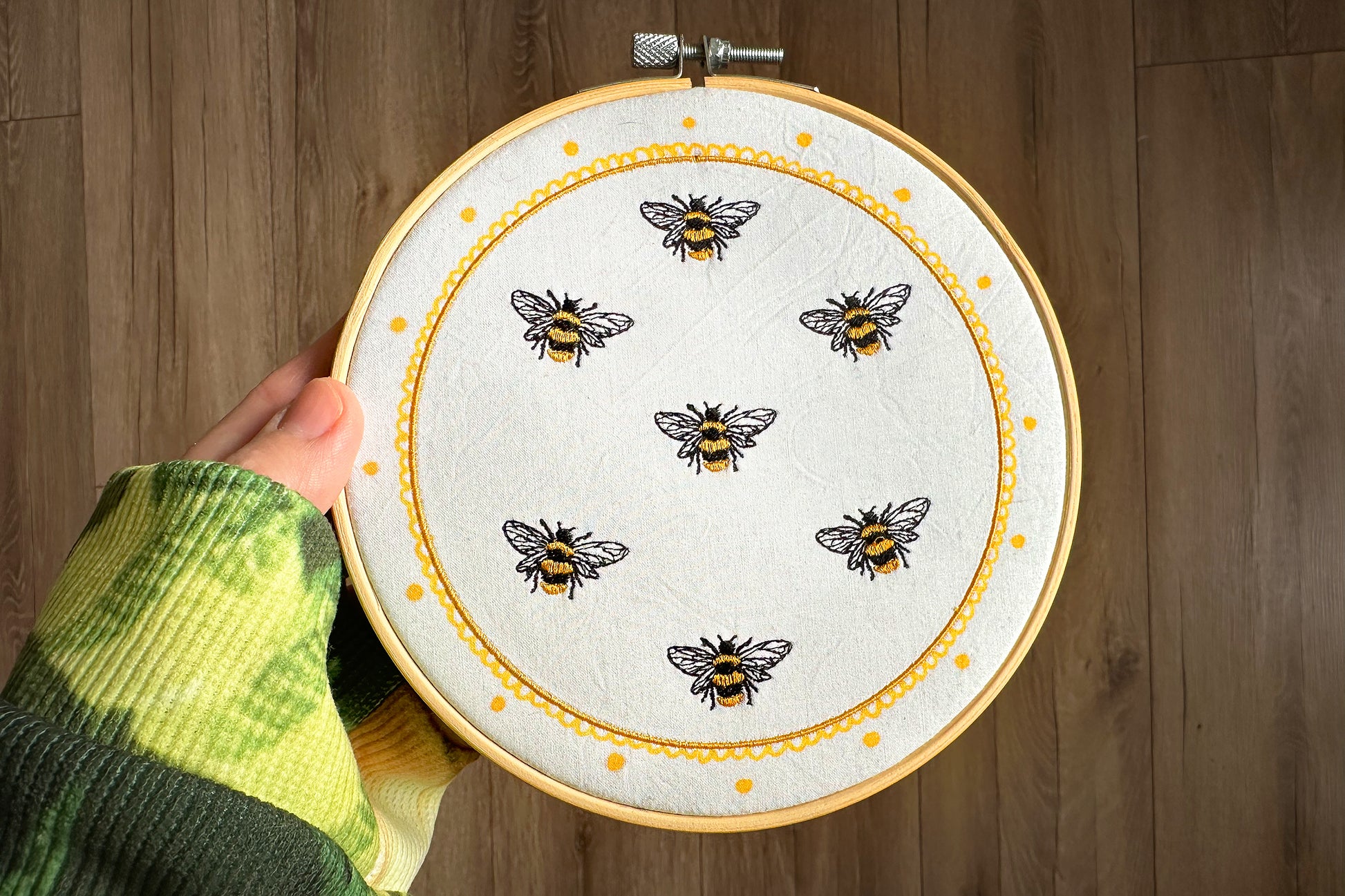 Embroidered bee swarm effect using same digital design