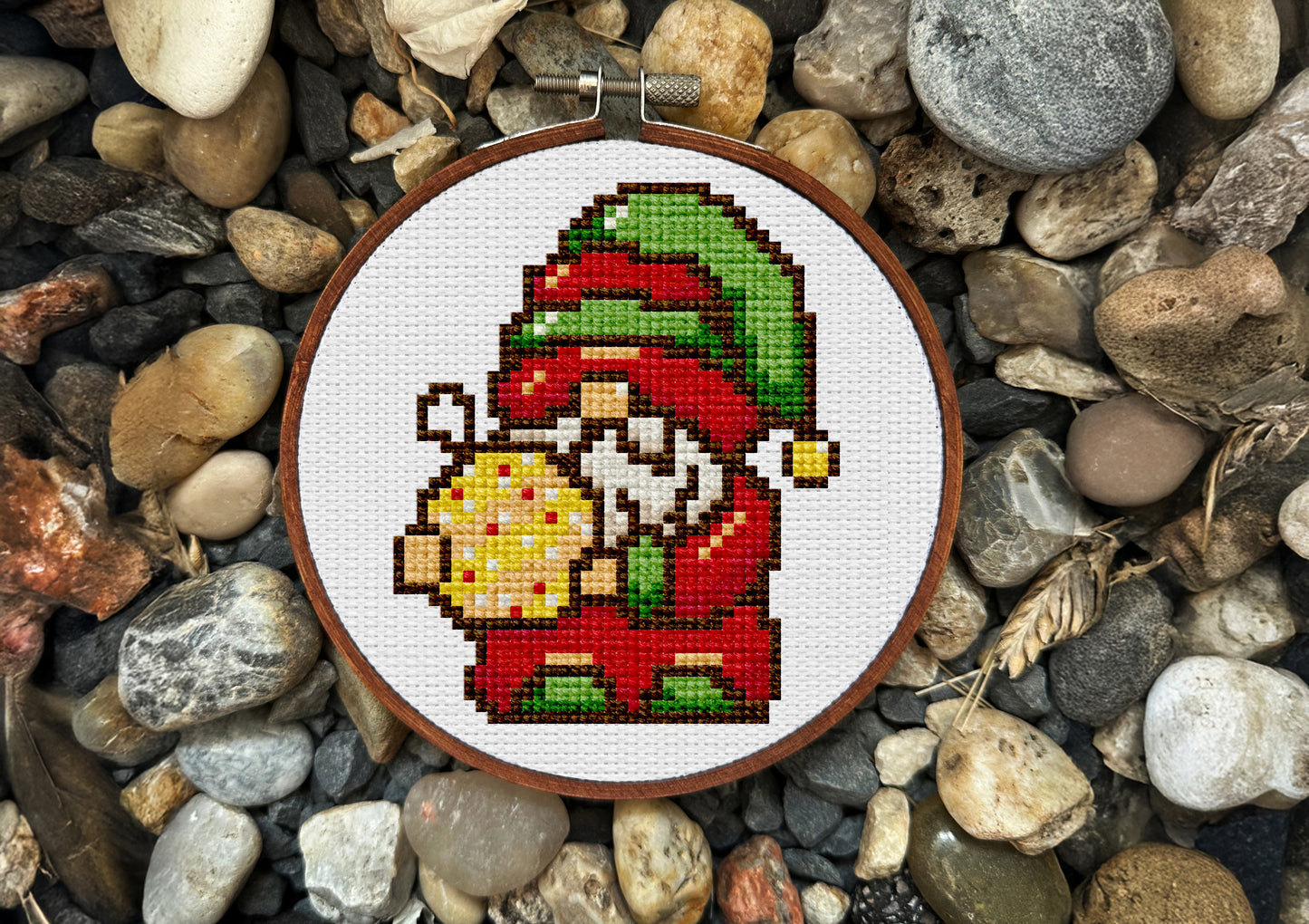 Holiday embroidery design featuring gnome and bauble
