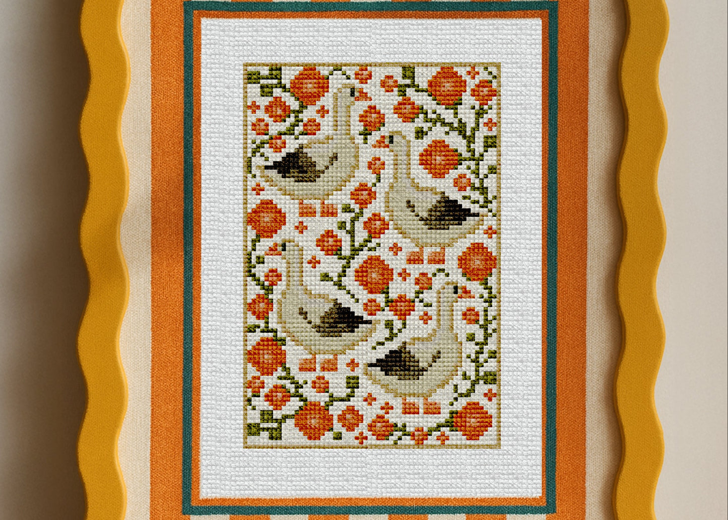 Autumn geese cross-stitch pattern with flowers and cozy fall colors