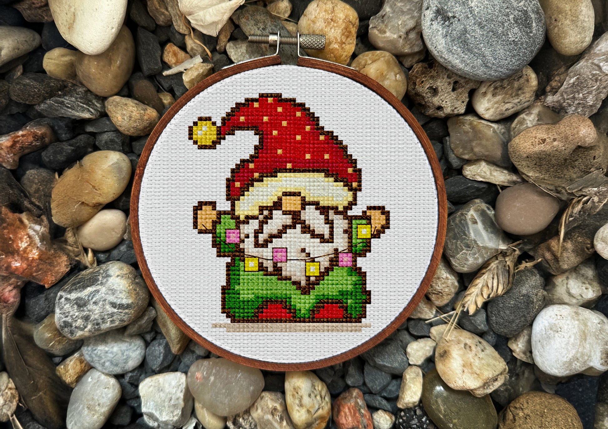 Pixel-art gnome cross-stitch pattern for cozy holiday décor