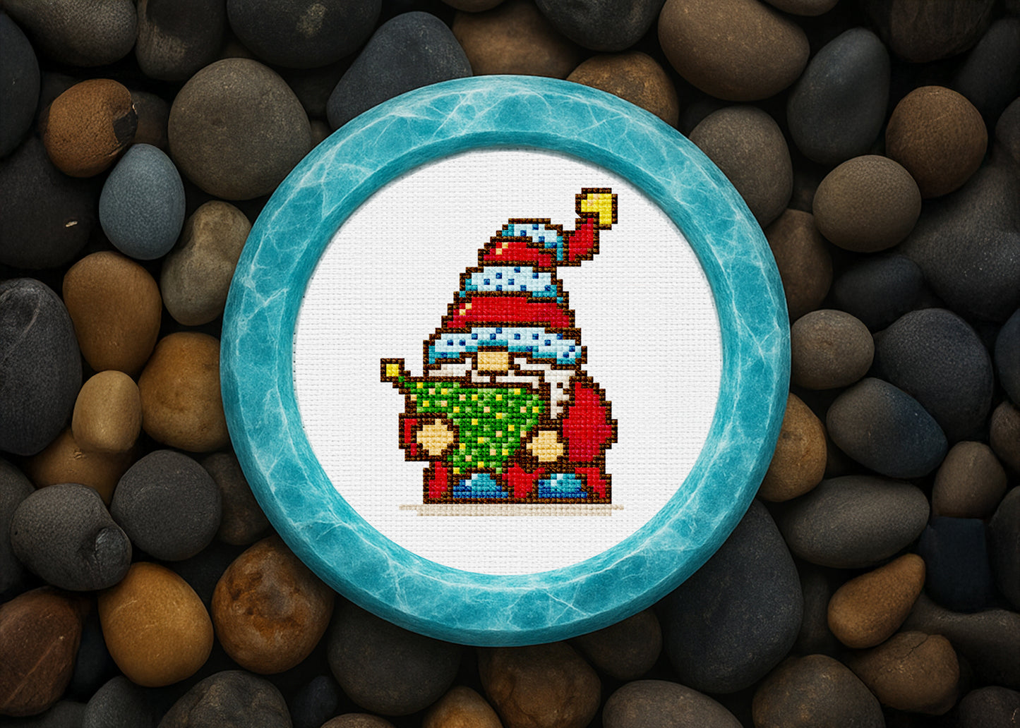 Christmas gnome cross-stitch art holding small Christmas tree